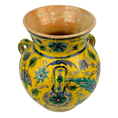 Lot 108 - A Palestine pottery three handled pot, Early-mid 20th century.