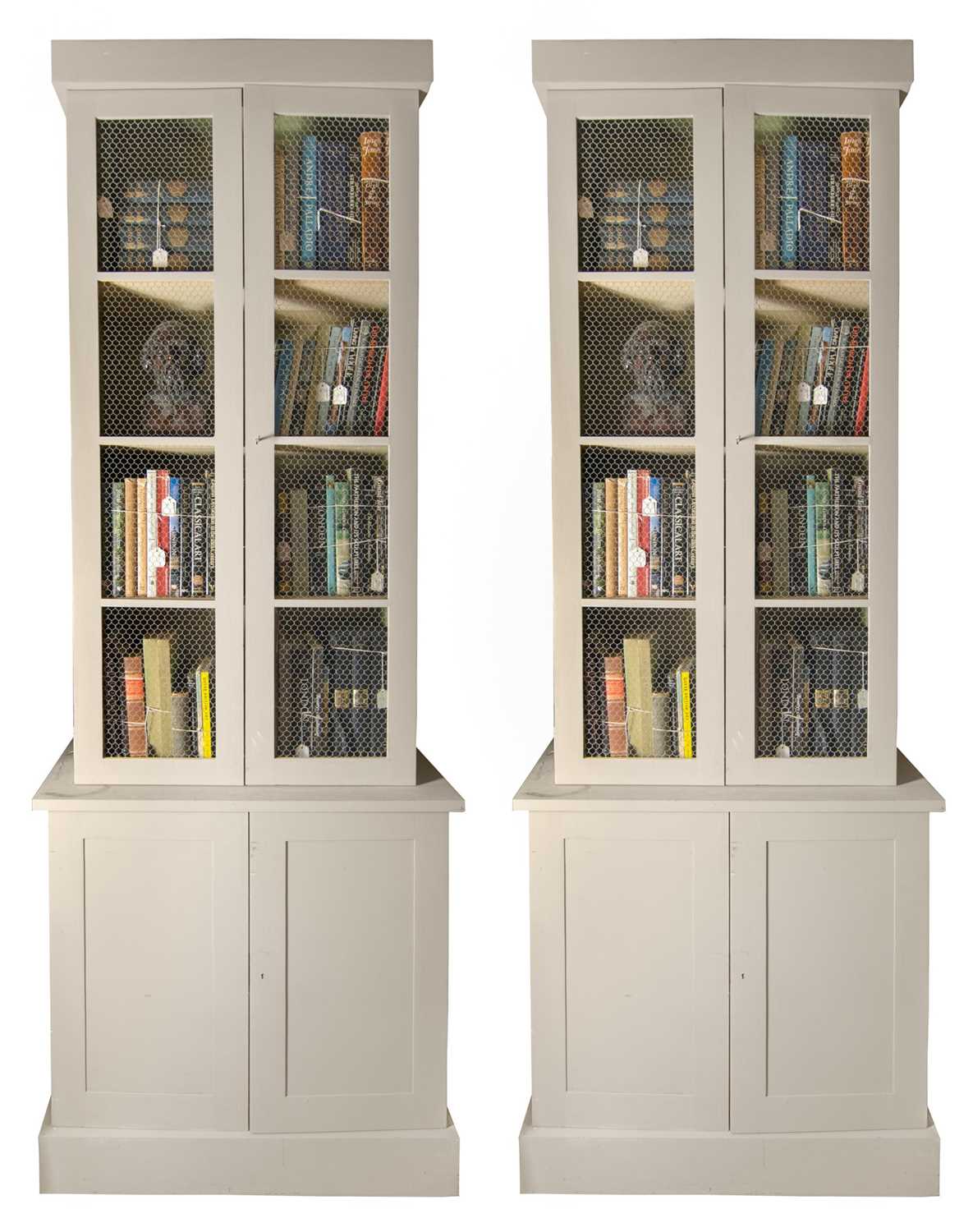 Lot 273 - A pair of grey bookcases