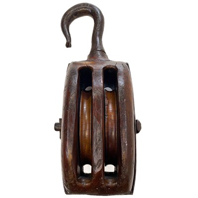 Lot 250 - A large 19th century teak and iron bound ships block and tackle.