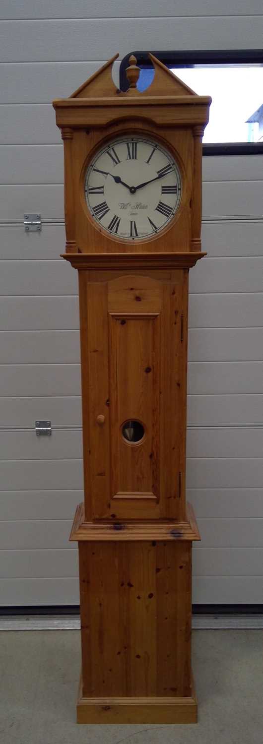 Lot 221 A Pine longcase clock with a battery