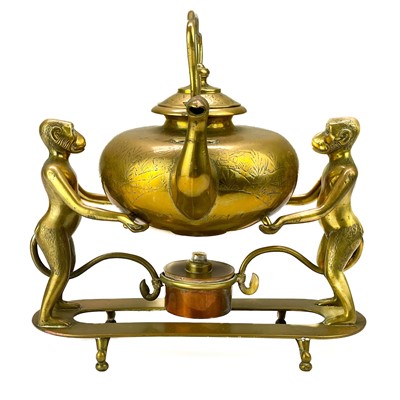 Lot 122 - An unusual Eastern brass kettle and stand.