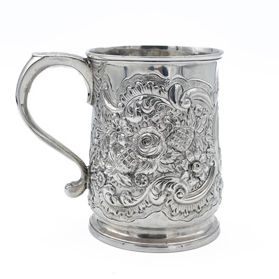 Lot 194 - An early George III silver embossed half pint mug by Thomas Whipham & Charles Wright.