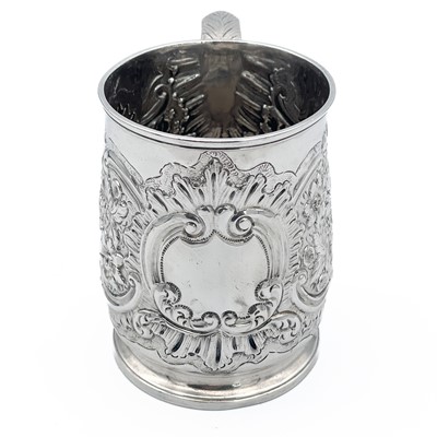 Lot 68 - An early George III silver embossed half pint mug by Thomas Whipham & Charles Wright.