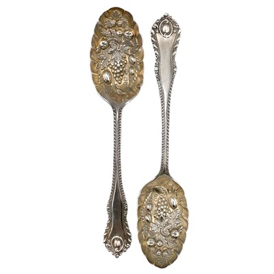 Lot 183 - A pair of Victorian heavy silver berry spoons by Henry Wigfull.