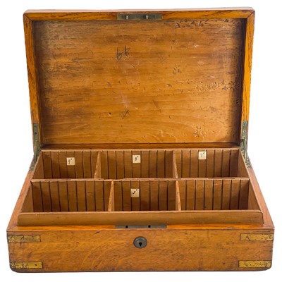 Lot 114 - An oak and brass bound campaign style box.