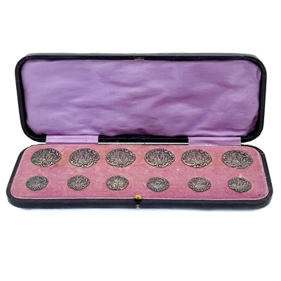 Lot 405 - A Victorian cased set of twelve silver buttons by Levi & Salaman.