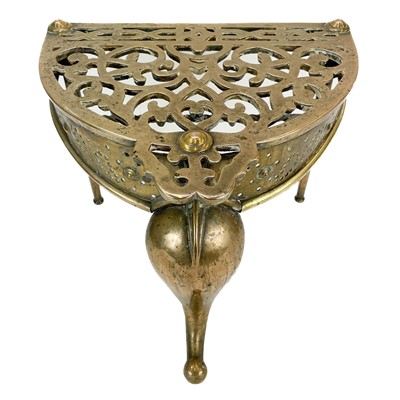 Lot 73 - A George III heavy brass and wrought iron footman.