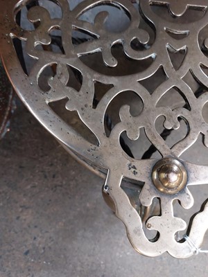 Lot 73 - A George III heavy brass and wrought iron footman.