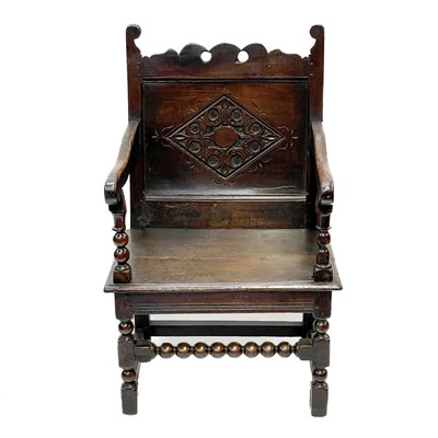 Lot 132 - A 17th century North Country bobbin Wainscot chair.