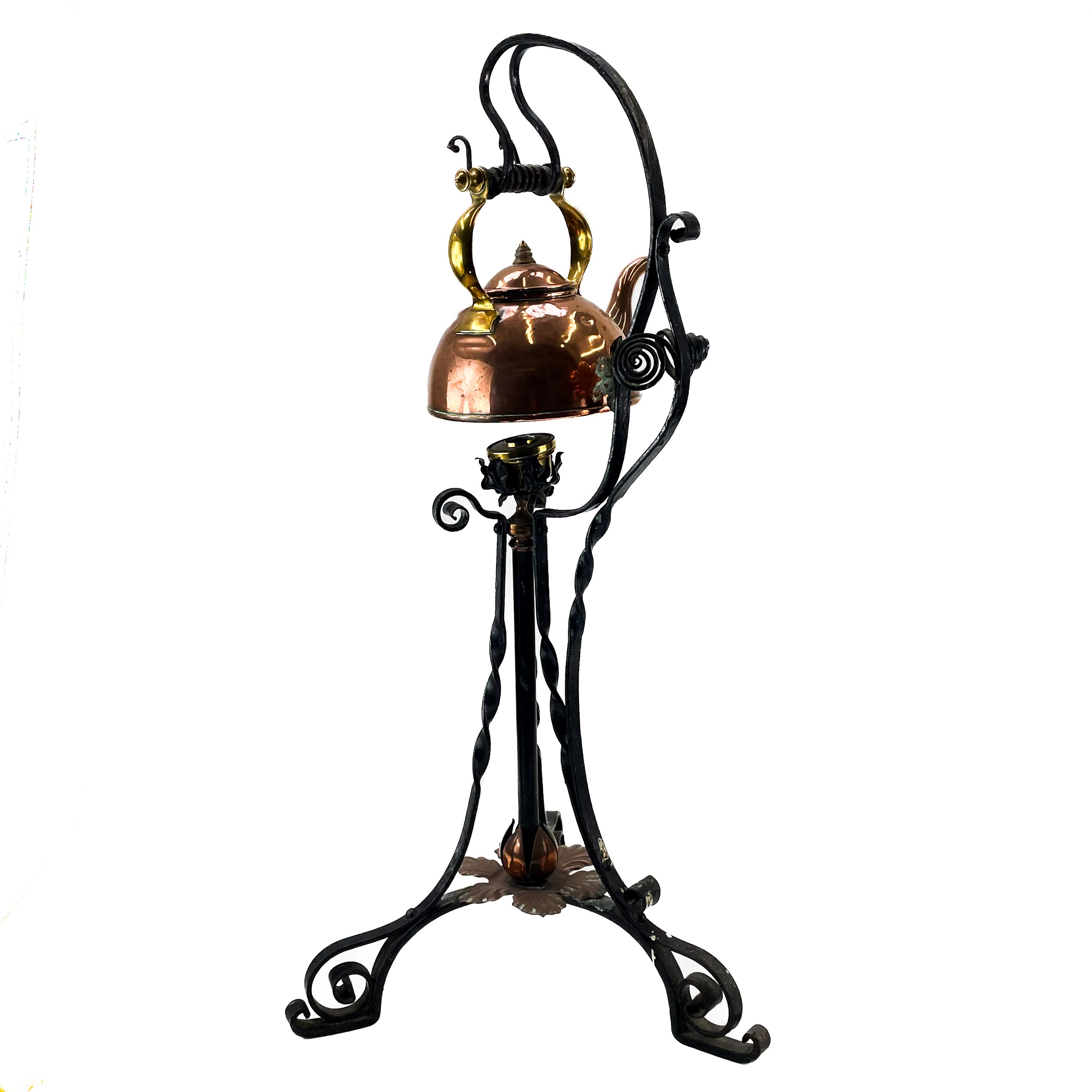 Lot 167 - A Victorian copper and wrought iron kettle