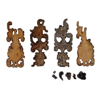 Lot 222 - Two carved oak finials or mounts.