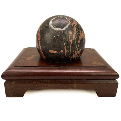 Lot 22 - A Torquay Devon turned marble sphere.