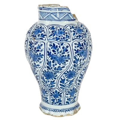 Lot 196 - A Delft blue and white baluster vase in the Kangxi style.